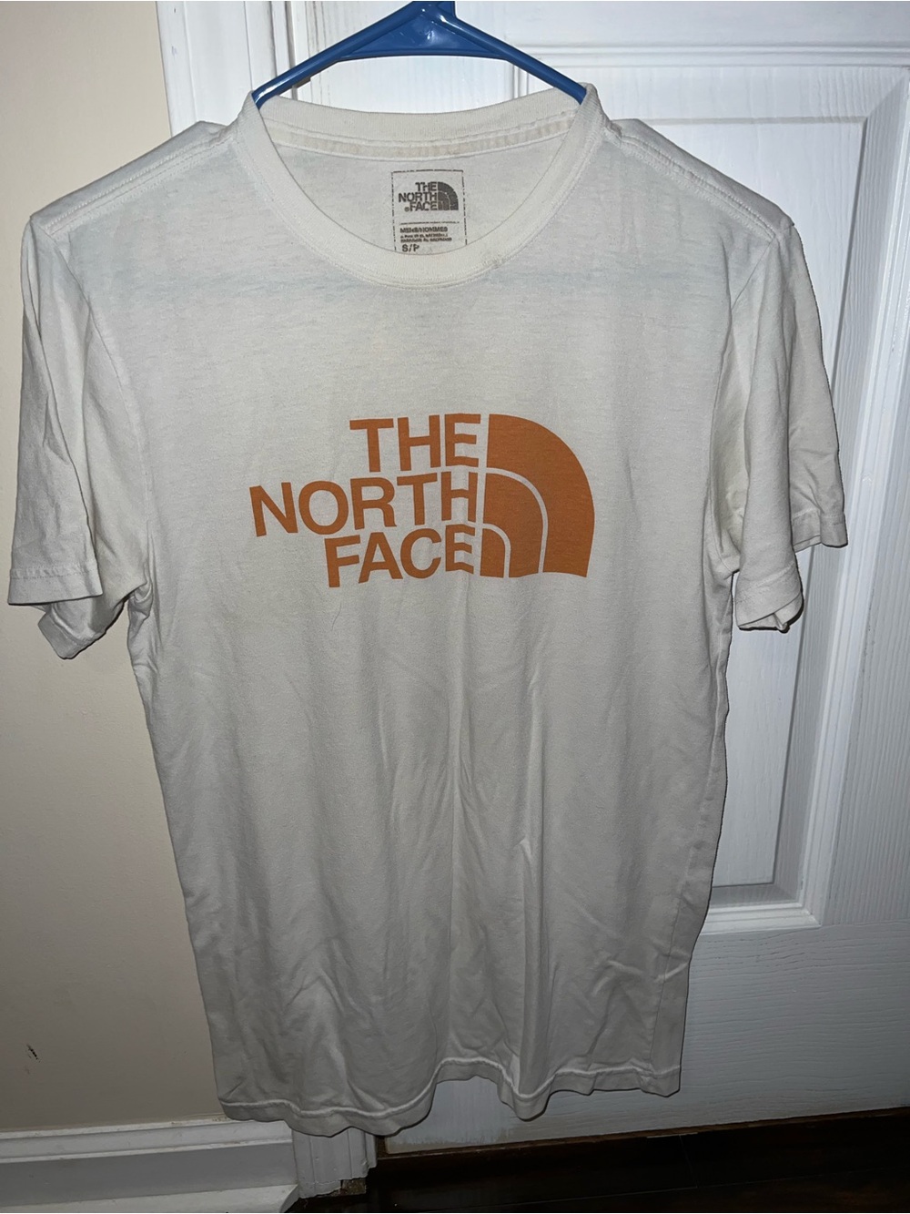 The North Face Men’s Cream Tee with Rust Logo